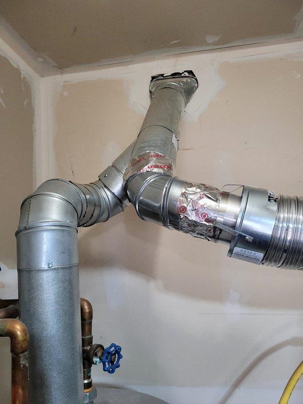 Completed full HVAC system installation including Lennox 80% efficiency gas furnace and air conditioning unit. Installed new ductwork routing with flexible and rigid metal sections, connected refrigerant lines with copper piping and shut-off valves, and ran PVC exhaust/intake venting for furnace combustion air. All equipment positioned, secured, and tested for proper operation per manufacturer specifications.