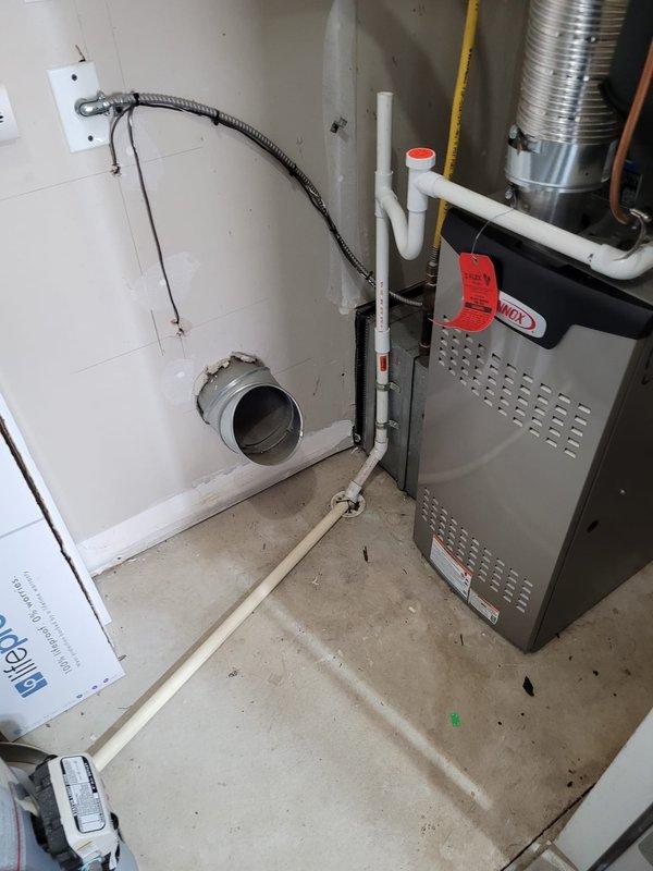 Completed full HVAC system installation including Lennox 80% efficiency gas furnace and air conditioning unit. Installed new ductwork routing with flexible and rigid metal sections, connected refrigerant lines with copper piping and shut-off valves, and ran PVC exhaust/intake venting for furnace combustion air. All equipment positioned, secured, and tested for proper operation per manufacturer specifications.