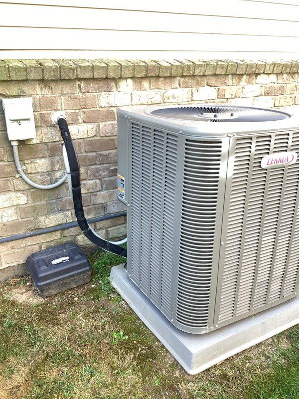 Conducted comprehensive site evaluation for complete HVAC system replacement at residential property. Assessed existing Lennox outdoor condensing unit, electrical disconnect, and associated components including conduit routing and junction boxes. Documented current equipment placement on concrete pad, verified electrical service configuration, and photographed installation conditions to prepare detailed replacement estimate with equipment specifications and scope of work.