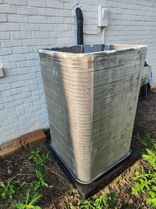 Completed comprehensive AC maintenance and tune-up on outdoor condensing unit. Performed standard seasonal maintenance including inspection of condenser coils, electrical connections, and internal blower assembly. All components found to be operating within normal parameters with routine dust accumulation noted and system confirmed operational.