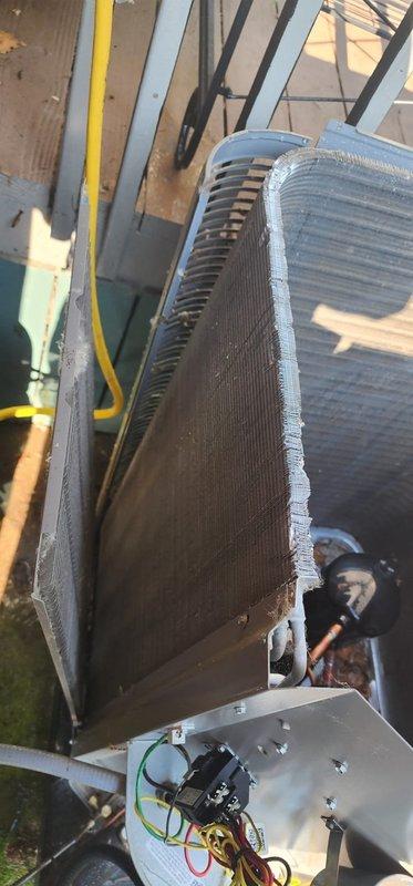 Completed scheduled AC maintenance on residential air conditioning system. Performed comprehensive inspection of outdoor condensing unit, including examination of capacitor and electrical components within service compartment. Inspected indoor evaporator coil and associated electrical connections in attic installation. Verified proper operation of all system components, checked wiring connections at junction box, and confirmed unit is functioning within normal parameters. All condenser coil fins and heat exchanger surfaces were assessed for condition and airflow efficiency.