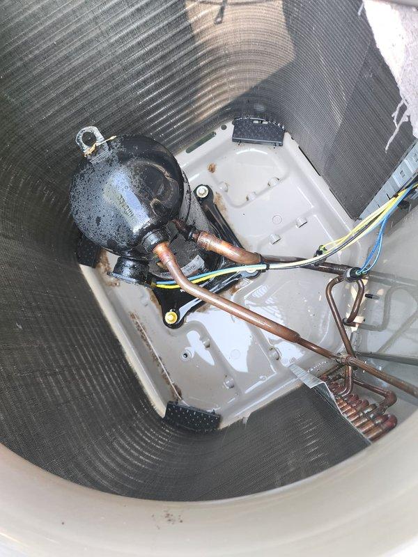 Completed routine preventive maintenance on residential air conditioning system. Inspected indoor air handler components including evaporator coil, condensate drain assembly, refrigerant lines, and accumulator, confirming proper operation and no visible leaks. Performed exterior inspection of condenser unit, verified electrical disconnect functionality, and cleared vegetation from around unit to ensure adequate airflow and system efficiency.