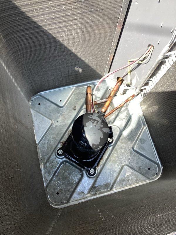 Completed preventive maintenance service on residential split-system air conditioning unit. Performed comprehensive inspection of outdoor condenser unit, including visual examination of compressor assembly, refrigerant lines, copper tubing connections, and heat exchanger coils. Verified proper mounting and structural integrity of all components, documented equipment condition through photographic records, and confirmed system readiness for continued cooling operation under the Worry Free Service Agreement.