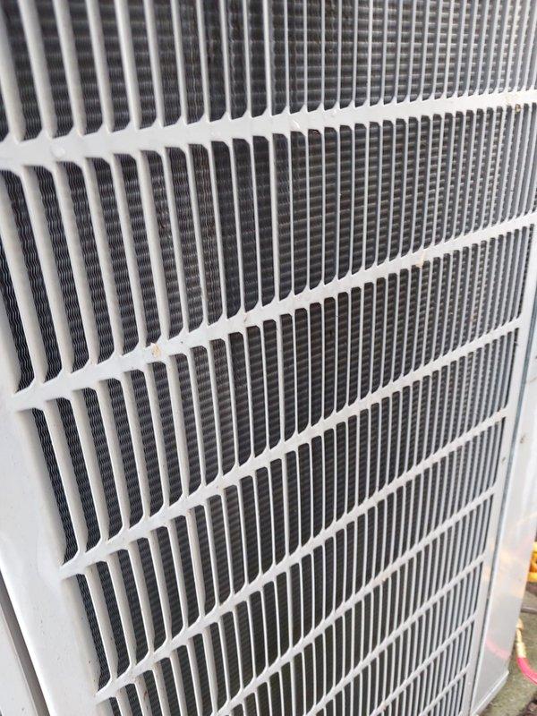 Completed routine air conditioning maintenance and tune-up on outdoor condensing unit. Performed comprehensive system inspection, including examination of exterior cabinet panels, condenser coil fins, and blower assembly. All components found to be in operational condition with normal wear patterns consistent with regular use.