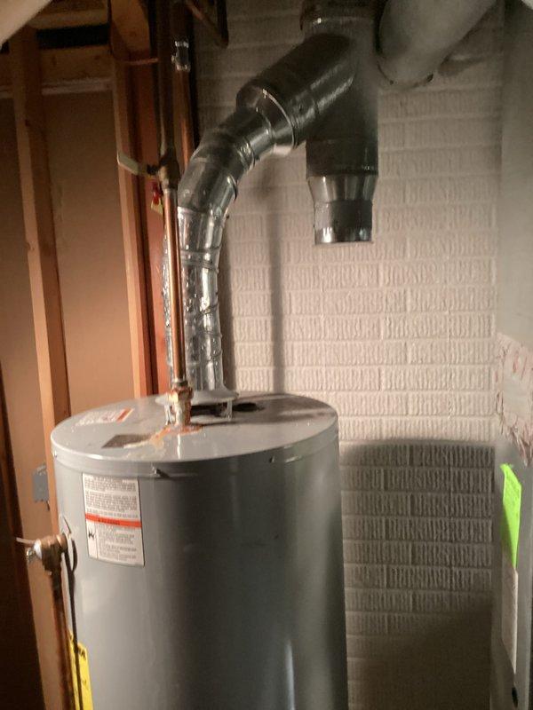 Responded to emergency service call for leaking water heater in basement of 20-year-old residential property. Upon arrival, assessed existing water heater condition and confirmed active leak requiring immediate replacement. Coordinated same-day installation per customer request. Removed and disposed of failed water heater unit. Installed new residential water heater in basement location, connecting all supply lines, discharge piping, and venting systems to code specifications. Verified proper operation of new unit and ensured all connections were secure and leak-free.