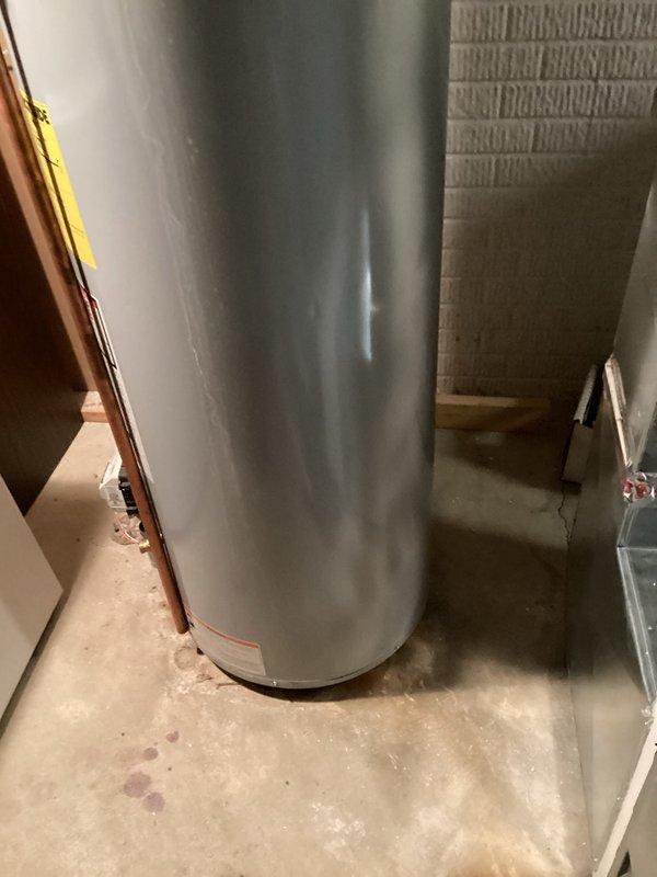 Responded to emergency service call for leaking water heater in basement of 20-year-old residential property. Upon arrival, assessed existing water heater condition and confirmed active leak requiring immediate replacement. Coordinated same-day installation per customer request. Removed and disposed of failed water heater unit. Installed new residential water heater in basement location, connecting all supply lines, discharge piping, and venting systems to code specifications. Verified proper operation of new unit and ensured all connections were secure and leak-free.