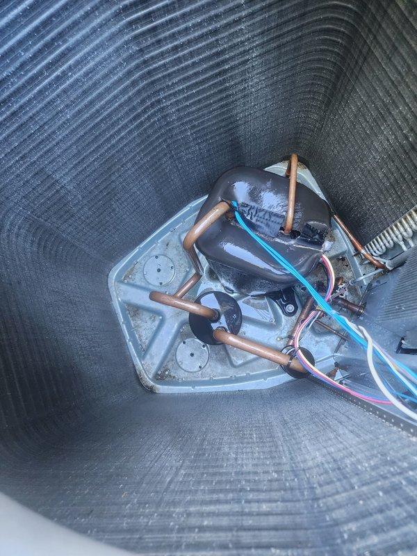Completed scheduled AC maintenance on residential split system unit. Performed comprehensive inspection of outdoor condenser unit including fan motor operation, refrigerant line connections, and electrical components. Removed top panel to access and verify proper fan blade function and motor assembly. Inspected indoor air handler components including compressor unit, copper refrigerant lines, drain pan condition, and electrical wiring connections. All system components found operating within normal parameters with no issues identified during this preventative maintenance visit.