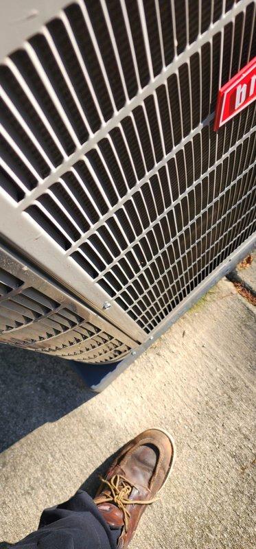 Completed routine AC maintenance on residential split system unit. Inspected outdoor condenser unit and indoor evaporator coil assembly, verifying proper operation of all components. Documented equipment condition with photographs showing evaporator coil in drain pan with visible condensate staining and outdoor condenser unit in good working condition. All mechanical connections and refrigerant lines intact. Customer account requires payment method update for prepaid maintenance program with outstanding balance for previous service months.