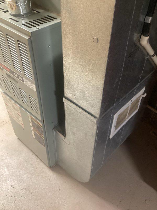 Conducted estimate for replacement of 10-year-old natural gas furnace system currently located in basement utility room. Existing equipment remains operational but customer seeking replacement options. Documented current installation including furnace unit, air handler, gas line connections with shut-off valve, PVC condensate drainage, and flexible ductwork to provide accurate replacement specifications and equipment recommendations.