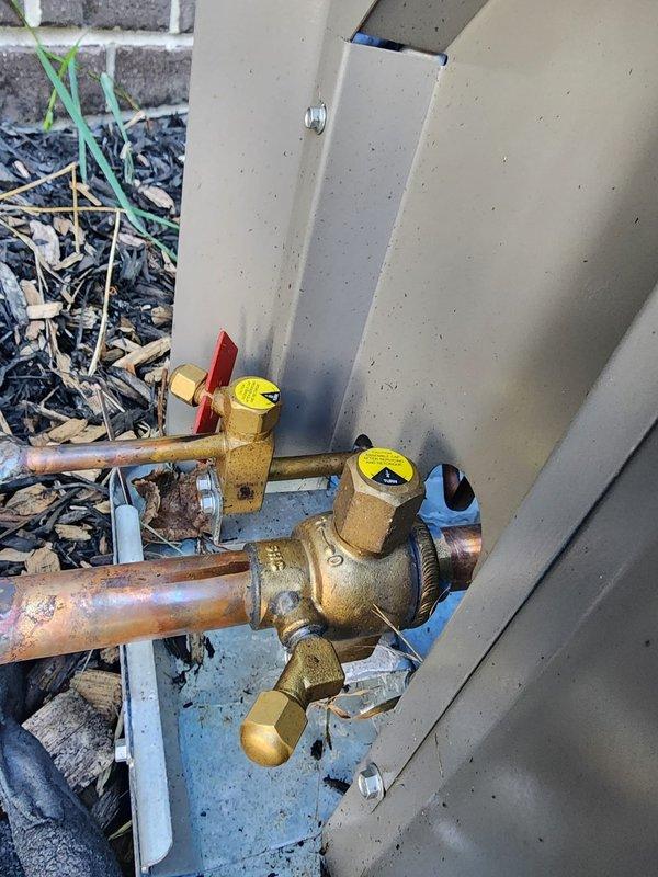 Completed warranty work on HVAC condenser unit by installing protective caps on valve connections at the outdoor condensing unit. Accessed equipment per prior authorization, secured all refrigerant line connections with appropriate valve caps to prevent contamination and ensure system integrity, and documented installation with photos per warranty requirements.