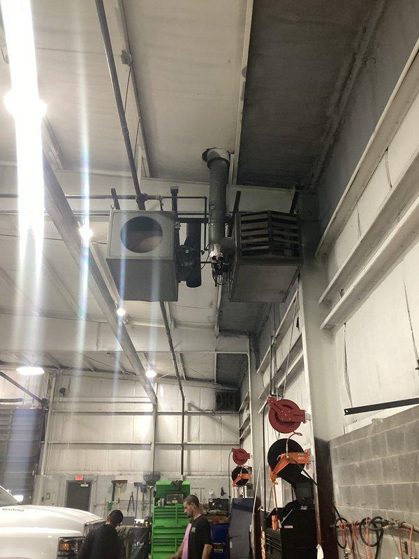 Conducted site assessment for radiant heating system replacement in large industrial facility currently equipped with tube heaters. Evaluated existing HVAC infrastructure including ceiling-mounted unit heaters, ductwork, and ventilation systems to determine optimal radiant heat installation approach. Documented current mechanical systems, structural components, and workspace layout to develop comprehensive estimate for converting facility from tube heating to radiant heating system.