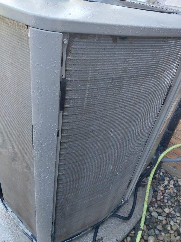 Completed scheduled preventive maintenance on residential air conditioning system under Worry Free Service Agreement. Performed comprehensive AC tune-up including inspection of outdoor condensing unit, condenser coil cleaning to remove accumulated dirt and debris from fins, verification of proper refrigerant levels through copper line connections, and examination of electrical components including capacitor and motor assembly. Checked condensate drainage system for proper operation and confirmed unit is operating within normal parameters with no deficiencies noted.