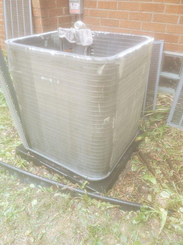 Completed routine seasonal AC tune-up on residential outdoor condensing unit as part of prepaid maintenance plan. Performed comprehensive system inspection including compressor operation, refrigerant line connections, electrical components, and condenser coil condition. All components found operating within normal parameters with no issues identified; unit left in proper working order with protective covering in place.