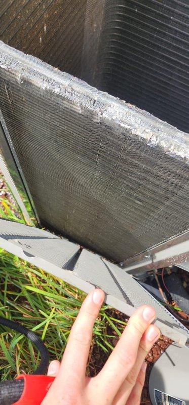 Completed comprehensive AC tune-up and preventive maintenance on residential cooling system under prepaid maintenance plan. Performed standard inspection of compressor, condenser coils, refrigerant lines, and electrical components. Noted mineral deposit buildup along condenser coil edge and rust discoloration on unit housing; system operating within normal parameters with no immediate service needs identified.