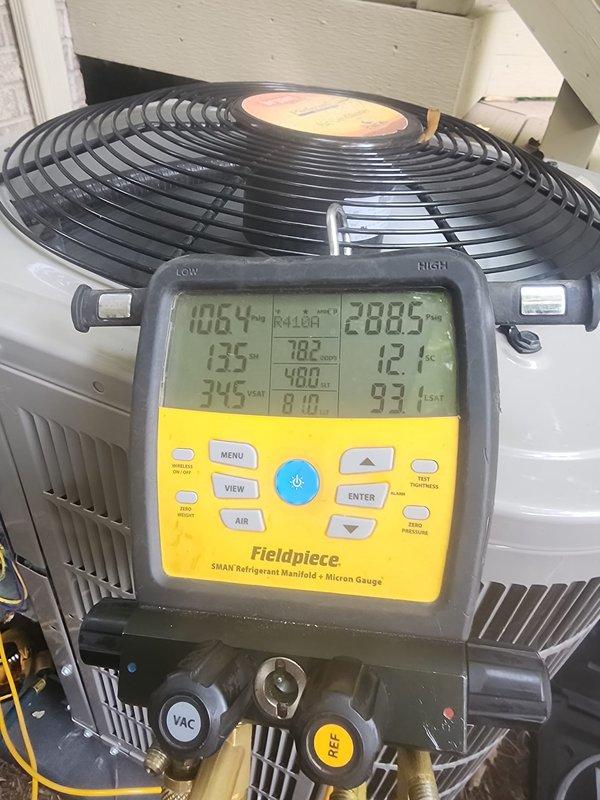 Completed preventative maintenance on two residential air conditioning systems. Connected Fieldpiece SMAN digital manifold with micron gauge to both outdoor condenser units to verify refrigerant pressures, superheat, and subcooling values. Systems were operating within normal parameters with proper refrigerant charge levels confirmed through diagnostic readings. Both units showed adequate airflow through condenser coils and fan assemblies functioning properly.