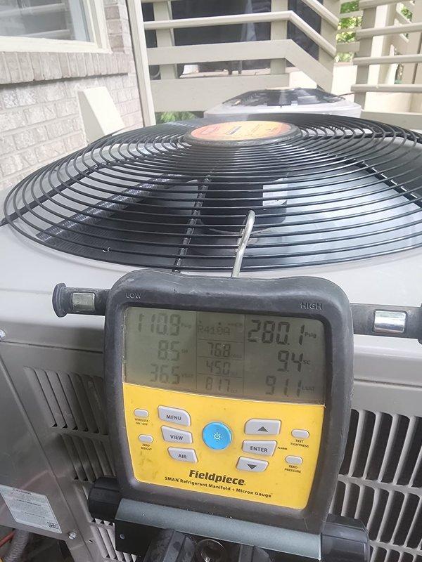 Completed preventative maintenance on two residential air conditioning systems. Connected Fieldpiece SMAN digital manifold with micron gauge to both outdoor condenser units to verify refrigerant pressures, superheat, and subcooling values. Systems were operating within normal parameters with proper refrigerant charge levels confirmed through diagnostic readings. Both units showed adequate airflow through condenser coils and fan assemblies functioning properly.