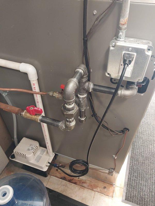 Responded to gas odor callback near recently installed furnace. Upon arrival, customer had already shut off gas supply as a safety precaution. Conducted thorough inspection of all gas piping connections, joints, and fittings throughout the installation using leak detection solution. Inspected gas valve connections at furnace inlet, union fittings, and black iron piping assembly. All connections tested tight with no leaks detected. Verified proper installation of gas line components and confirmed all fittings were properly torqued to manufacturer specifications. Inspected PVC venting system for proper installation and clearances. Checked condensate drainage piping and trap assembly. Restored gas supply and performed combustion analysis to verify safe operation. Unit fired normally with proper flame characteristics and no abnormal odors detected during operation. Educated customer on difference between initial gas odor from new equipment and actual gas leaks. System operating safely and 