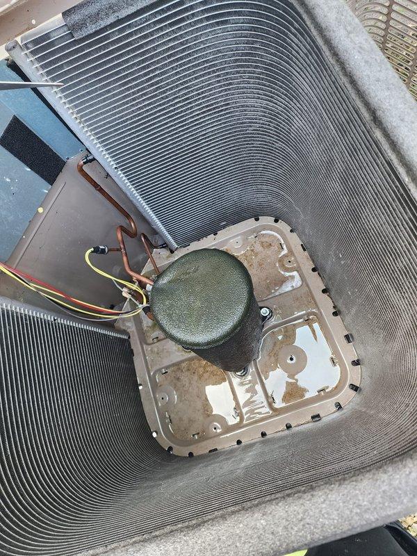 Completed comprehensive AC tune-up on residential outdoor condenser unit. Performed full system inspection, cleaned condenser coils showing dirt accumulation, verified proper fan motor operation, checked electrical connections and refrigerant lines, and confirmed unit is operating within normal parameters for the upcoming cooling season.