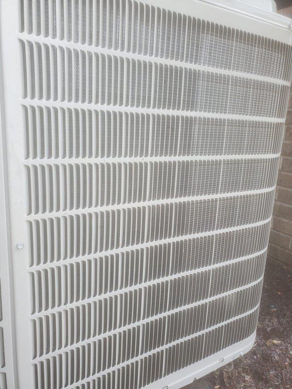 Completed scheduled air conditioning maintenance service during afternoon appointment. Performed inspection of outdoor condenser unit, which showed normal weathering and operational condition with clean louver fins allowing proper airflow. Inspected indoor air handler and drain pan system, noting presence of condensate water in emergency overflow pan with refrigerant lines and connections in serviceable condition.