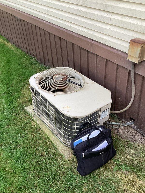 Completed comprehensive HVAC estimate for replacement of existing R22 air conditioning system. Evaluated current outdoor condensing unit positioned on concrete pad adjacent to residential structure, assessed system age and refrigerant type, and documented equipment condition through detailed photography. Provided homeowner with replacement options for upgrading to modern, environmentally-compliant refrigerant system with improved energy efficiency ratings.