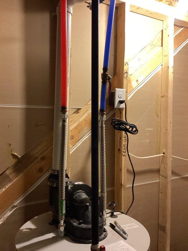 Conducted estimate for replacement of existing 11-year-old Bradford White 50-gallon Defender ND water heater currently installed in utility area. Assessed existing installation including plumbing connections, venting configuration, electrical supply, and drainage pan setup. Documented current unit specifications and photographed installation to provide accurate replacement quote for new water heater system.
