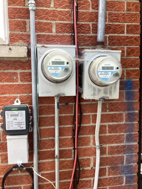 Performed comprehensive electrical assessment for generator installation at residential property. Evaluated existing electrical infrastructure including main service panel located in attic space and exterior meter configuration serving multiple units. Documented current electrical panel capacity, breaker arrangement, and available circuits in Westinghouse load center to determine compatibility with proposed generator system. Assessed exterior meter bank installation consisting of two digital smart meters and one DTS meter with associated conduit runs to identify proper connection point for generator transfer equipment. Captured detailed photographic documentation of panel interior showing circuit breaker layout and available spaces, as well as exterior service entrance configuration including PVC and metallic conduit routing for preparation of formal generator installation estimate.