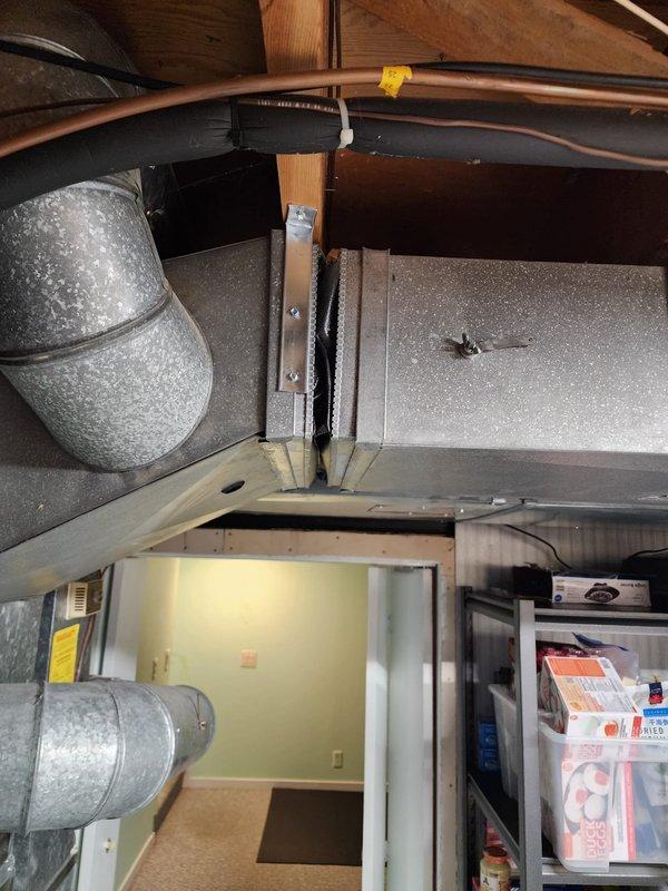 Responded to callback for HVAC installation to address horizontal duct canvas connector alignment issue. Upon inspection in attic space, verified air handler installation and examined flexible ductwork connections to ensure proper alignment and secure attachment of canvas boot to horizontal supply duct. Corrected alignment of canvas connector, confirmed all ductwork properly supported and sealed, and verified system operational integrity with no air leakage at connection points.