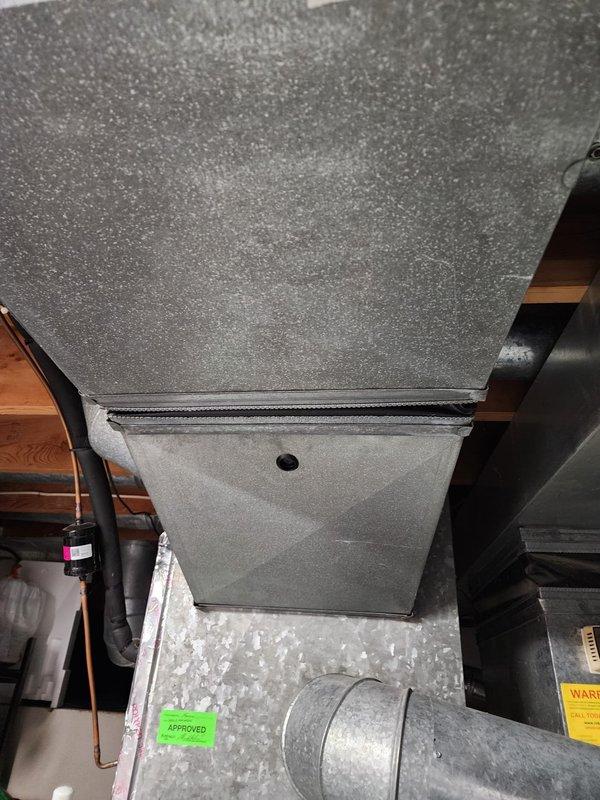 Responded to callback for HVAC installation to address horizontal duct canvas connector alignment issue. Upon inspection in attic space, verified air handler installation and examined flexible ductwork connections to ensure proper alignment and secure attachment of canvas boot to horizontal supply duct. Corrected alignment of canvas connector, confirmed all ductwork properly supported and sealed, and verified system operational integrity with no air leakage at connection points.