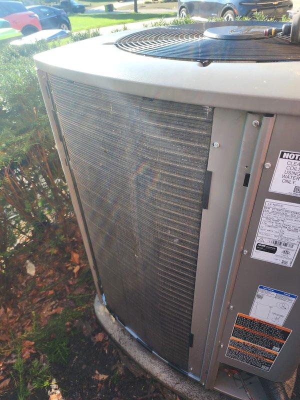 Completed comprehensive preventive maintenance on dual outdoor HVAC condenser units at residential property. Performed standard maintenance protocol including inspection of refrigerant levels, electrical connections, and mechanical components on both systems. One unit is covered under prepaid maintenance plan; second unit serviced as additional requested service. Both condensers operational and functioning within normal parameters. Documented equipment condition with photographic evidence showing units positioned on concrete pads with proper clearances maintained. No immediate repairs required at time of service.