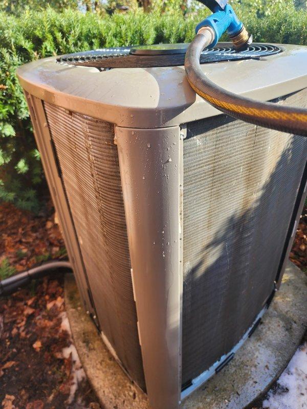 Completed comprehensive preventive maintenance on dual outdoor HVAC condenser units at residential property. Performed standard maintenance protocol including inspection of refrigerant levels, electrical connections, and mechanical components on both systems. One unit is covered under prepaid maintenance plan; second unit serviced as additional requested service. Both condensers operational and functioning within normal parameters. Documented equipment condition with photographic evidence showing units positioned on concrete pads with proper clearances maintained. No immediate repairs required at time of service.