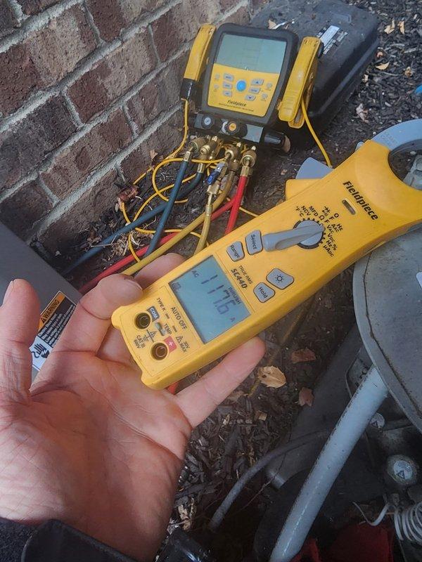 Responded to no cooling call on 10-year-old air conditioning system. Upon arrival, verified outdoor unit was not operating. Inspected electrical panel and found tripped breaker supplying power to condenser unit. Reset breaker and verified proper voltage at disconnect. Used digital multimeter to confirm electrical supply to outdoor unit within manufacturer specifications. Tested system operation with manifold gauges connected to service ports, monitoring refrigerant pressures and temperatures. System restored to normal cooling operation with all components functioning properly.