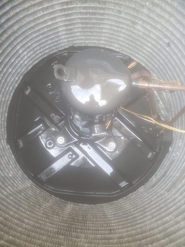 Completed preventive maintenance inspection on residential air conditioning system per Worry Free Service Agreement protocol. Upon inspection, discovered significant frost and ice accumulation on evaporator coil, indicating potential airflow restriction or refrigerant charge issue. Documented compressor assembly condition and refrigerant line configuration with photographic evidence. System requires follow-up evaluation to address frost buildup and ensure proper cooling operation.