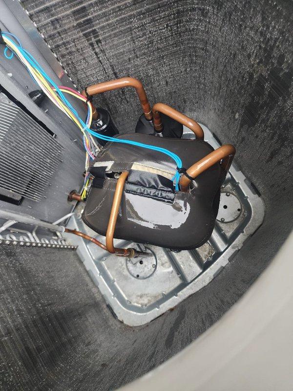 Completed scheduled cooling system maintenance and tune-up on residential split air conditioning system. Performed comprehensive inspection of indoor evaporator coil unit located in attic space and outdoor condenser unit, verifying proper operation of all components including refrigerant lines, electrical connections, and fan assemblies. System confirmed to be operating properly with no issues identified during service visit.