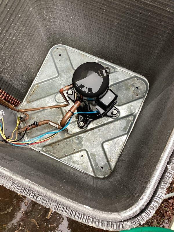 Completed scheduled cooling maintenance on residential HVAC system. Performed comprehensive inspection of indoor air handler unit, verifying proper motor mount assembly, electrical connections, and refrigerant line integrity. Inspected outdoor condenser unit, noting weathered exterior casing with normal patina from environmental exposure. Cleaned condenser coils and surrounding area, confirmed unit operating on proper pad with adequate drainage. All electrical connections, refrigerant lines, and mechanical components found secure and functioning within normal parameters.