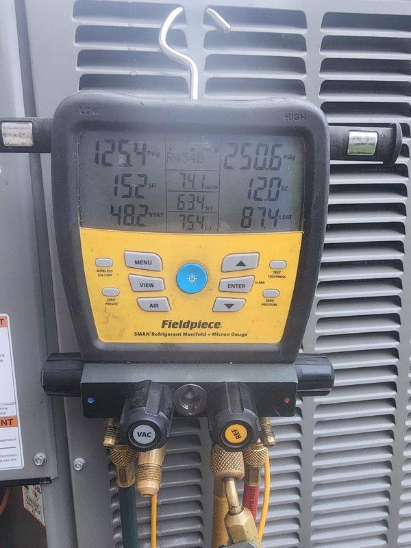 Responded to AC not working callback. Upon arrival, verified system was not operating. Inspected electrical panel and confirmed circuit breaker had tripped to OFF position. Reset 40-amp breaker supplying power to outdoor condensing unit. Connected refrigerant manifold gauges to service ports and verified system pressures and temperatures returned to normal operating parameters after power restoration. System tested and confirmed cooling properly with appropriate superheat and subcooling readings. Unit left in proper working condition.