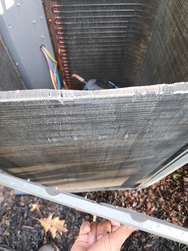 Completed comprehensive AC tune-up and preventive maintenance on outdoor condensing unit. Performed visual inspection of evaporator coil assembly, noting moderate dust and debris accumulation on aluminum fins; inspected compressor unit, refrigerant lines, and electrical connections, confirming all components operational with no immediate service needs identified. System operating within normal parameters at time of service.