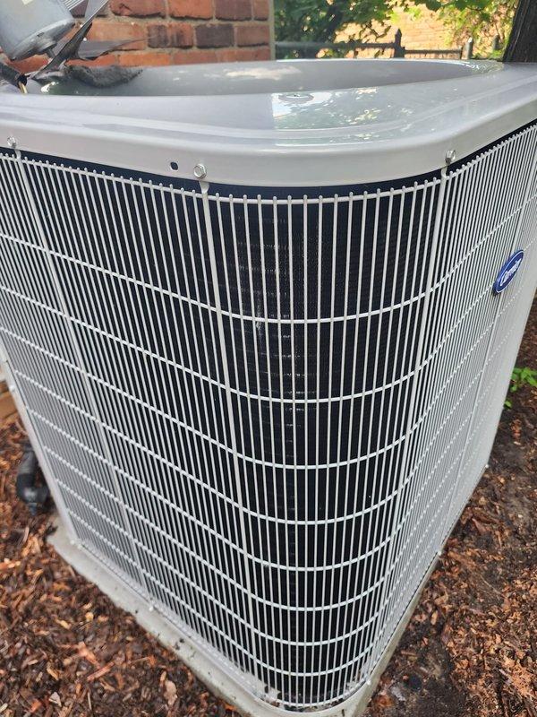 Completed routine AC maintenance on residential condensing unit. Performed comprehensive system inspection, cleaned condenser coils, checked refrigerant lines and electrical connections, verified compressor operation, and documented equipment condition with interior and exterior photographs showing all major components functioning properly.
