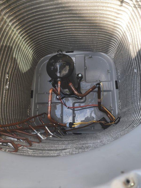 Completed comprehensive maintenance on 5-year-old air conditioning system as part of prepaid service plan. Performed standard AC tune-up including inspection of outdoor condensing unit, verified proper operation of all components, and documented system condition with no issues found. Additionally serviced hot water heater with focus on anode rod inspection per customer request regarding greenish-blue corrosion buildup, assessed rod condition and water heater internal components.