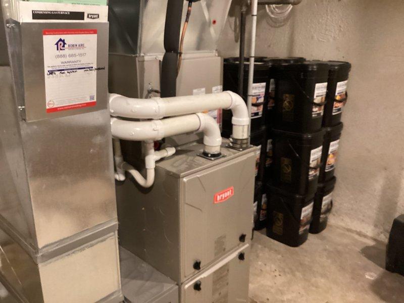 Successfully installed a 40-gallon tanked water heater in the mechanical room, completing all necessary plumbing connections and ensuring proper venting through PVC piping. The installation included securing the unit with appropriate mounting hardware and integrating it with the existing HVAC system infrastructure. Additionally, relocated the air conditioning unit closer to the house structure to optimize system efficiency and meet installation specifications outlined in the project take-off notes.