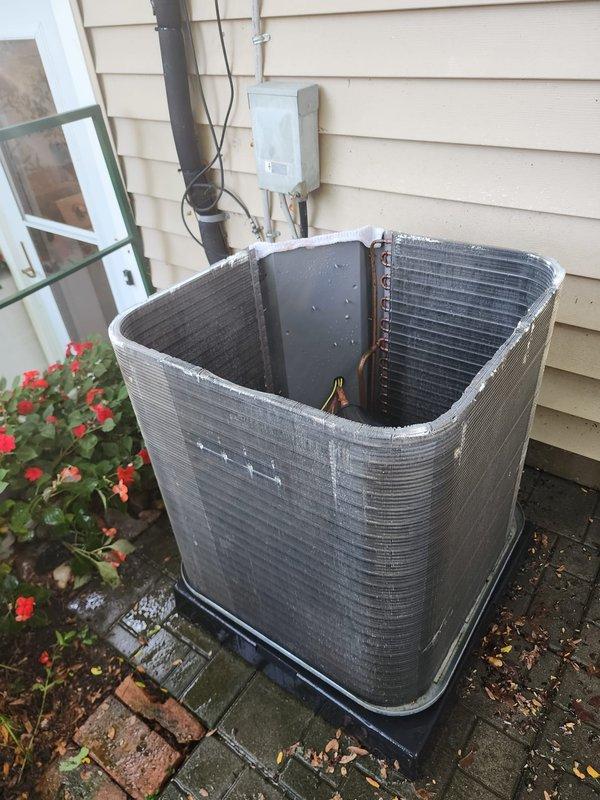 Completed annual AC tune-up on 4-year-old outdoor condensing unit. Performed comprehensive system inspection including visual assessment of condenser coil, refrigerant lines, electrical connections, and disconnect box. Documented equipment condition with photos showing unit positioned on pad with proper clearance, copper line connections intact, and electrical components secure. System operating within normal parameters for seasonal maintenance visit.