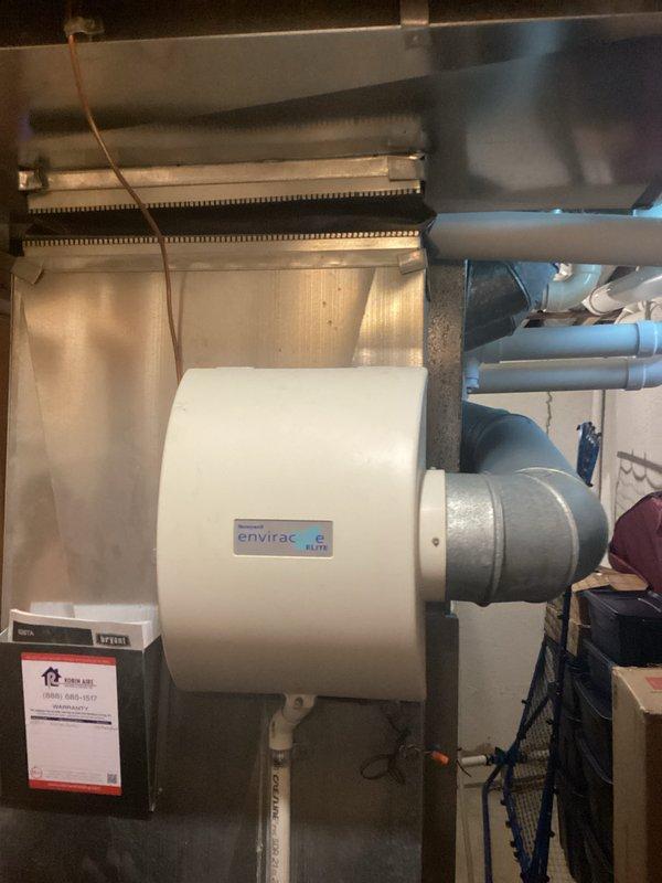 Completed estimate for HVAC system replacement after diagnosing fan motor overamping on R22 air conditioning unit. Documented existing Bryant furnace installation with humidifier system and assessed overall equipment condition to provide comprehensive replacement options for aging system.