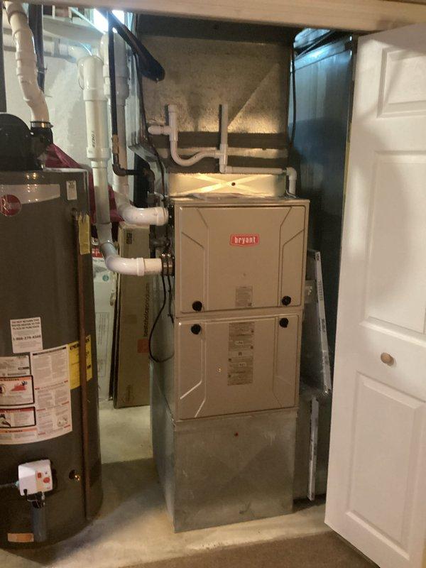 Completed estimate for HVAC system replacement after diagnosing fan motor overamping on R22 air conditioning unit. Documented existing Bryant furnace installation with humidifier system and assessed overall equipment condition to provide comprehensive replacement options for aging system.