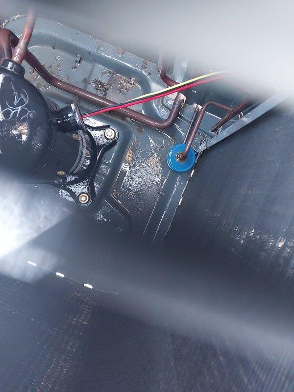 Responded to no cooling complaint on residential air conditioning system. Upon arrival, confirmed unit was running but not producing cool air. Performed diagnostic inspection of outdoor condenser unit and found compressor operating but system failing to cool effectively. Identified failed capacitor as root cause preventing proper compressor function. Replaced defective capacitor with new component, tested system operation, and verified proper cooling restored. Unit now operating within normal parameters and delivering adequate cool air to living space.