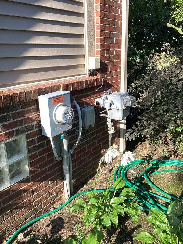 Conducted comprehensive electrical assessment for whole-house generator installation at residential property currently experiencing power outage. Evaluated existing electrical service, metering equipment, and optimal placement locations along brick foundation exterior, documenting site conditions and utility connections to develop accurate installation estimate for emergency backup power system.