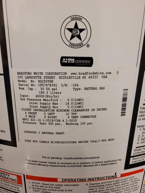 Installed a Bradford White 50-gallon natural gas tank water heater, Model RG250T6N, with 40,000 BTU/hr input capacity. Connected all necessary copper supply lines, gas piping, and exhaust venting to manufacturer specifications, ensuring proper clearances and compliance with ANSI Z21.10.1-2019/CSA 1.1-2019 standards for Category I natural draft appliances.