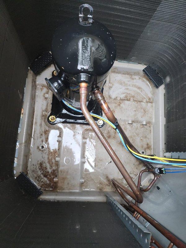 Completed comprehensive cooling system maintenance following resolution of bee infestation at outdoor unit. Performed standard preventive maintenance protocol including inspection of evaporator coil, condensate drainage system, and all accessible components. Evaporator coil showed minor debris accumulation between fins with some organic matter present; cleaned and verified proper airflow. Condensate pump and drain pan inspected and found operational with evidence of normal moisture exposure and minor rust staining consistent with system age. All electrical connections verified secure, refrigerant lines inspected for damage, and system tested for proper operation. Unit returned to full service with no deficiencies noted.