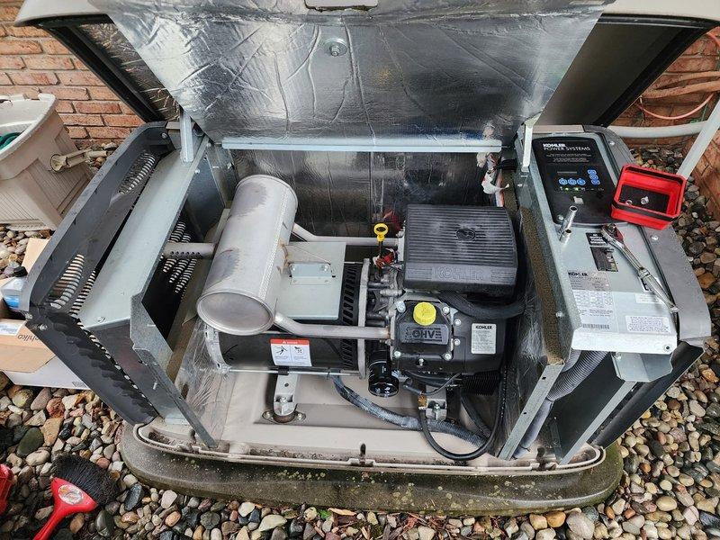 Completed scheduled maintenance on Kohler generator unit. Performed comprehensive inspection of electrical and mechanical components, including testing of dual run capacitors which were found to require replacement. Removed and replaced failed capacitors, verified proper operation of control board with indicator lights functioning normally, and conducted full system operational test to confirm generator performance and readiness.