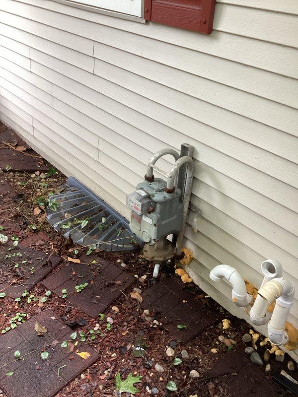 Conducted comprehensive site evaluation for residential backup generator installation. Assessed existing 120/240V electrical service panel with current circuit breaker configuration and documented available capacity for generator integration. Evaluated exterior utility area including natural gas meter location and identified optimal placement for automatic transfer switch and generator unit positioning. Documented existing electrical infrastructure, conduit routing pathways, and utility connections to determine material requirements and installation specifications for whole-house generator system with automatic transfer capabilities.