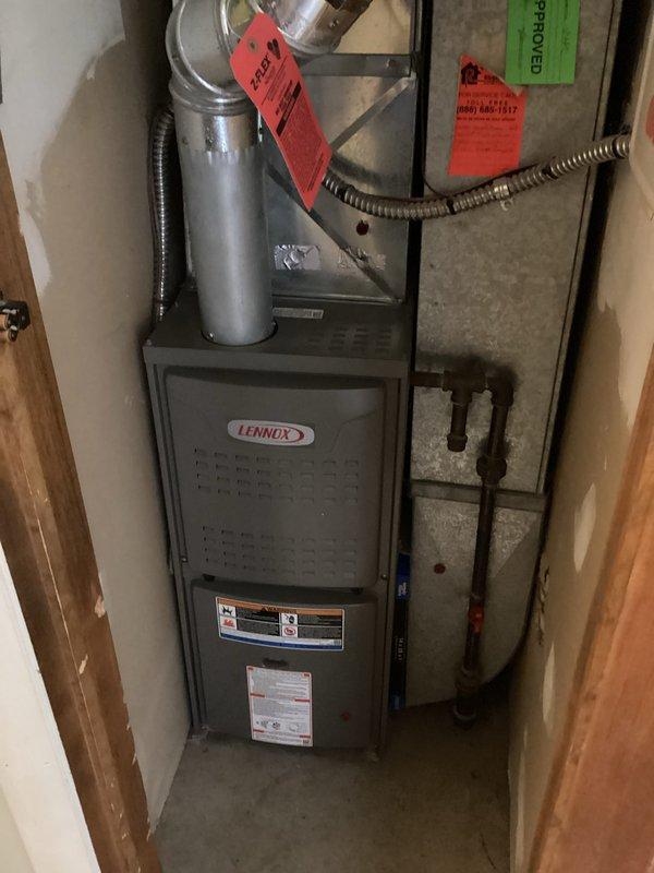 Completed routine maintenance on Lennox furnace system. Performed comprehensive inspection of blower motor assembly, capacitor, electrical connections, and control board with all components found operating within normal parameters. Customer opted to renew maintenance plan at time of visit, and system documentation was photographed for service records.