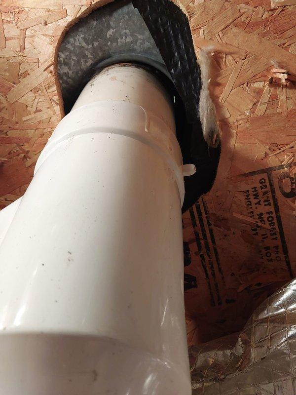 Responded to upstairs HVAC unit leaking issue. Upon inspection, located condensate drain line discharge point at roof penetration. Verified proper drainage and documented PVC condensate line routing from attic space through roof termination point, confirming system is draining appropriately and leak has been resolved.